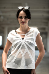 Woman wearing organic cotton and bamboo tee with mesh butterfly pattern design