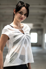 Woman wearing organic cotton and bamboo tee with mesh butterfly pattern design